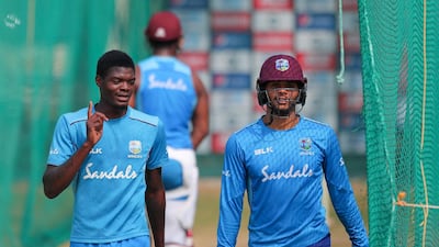 West Indies bowler Alzarri Joseph, left, with Brandon King during a training session in Hyderabad. AP