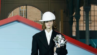 A model carries a bag shaped like a bouquet. Photo: Louis Vuitton