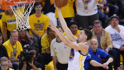 Klay Thompson #11 of the Golden State Warriors goes up against the Cleveland Cavaliers in the first half during Game Five of the 2015 NBA Finals at ORACLE Arena on June 14, 2015 in Oakland, California. Thearon W. Henderson/Getty Images