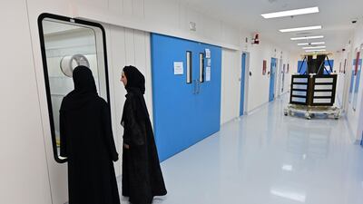Engineers walk the corridors of Mohammed Bin Rashid Space Centre. AFP