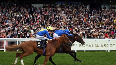 Daniel Tudhope riding Dream of Dreams (5) battles with Doyle riding Blue Point in The Diamond Jubilee Stakes. Getty Images