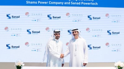 Mansoor Janahi, chief executive of Sanad Powertech, and Majed Al Awadi, general manager of Shams Power Company sign a maintenance deal. The contract marks the first collaboration between Mubadala's power generation companies. Photo: courtesy of Sanad