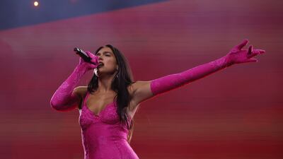 British singer Dua Lipa wearing a pink bodysuit and matching gloves, for the Future Nostalgia World Tour. EPA