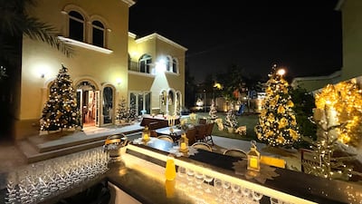 Gregory's backyard Christmas decor features a gold theme. Photo: Lucy Gregory