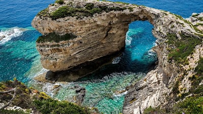 Paxos offers a quiet escape and turquoise waters. Alamy
