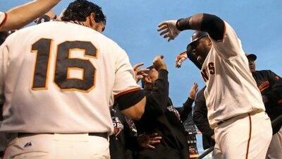 Pablo Sandoval, right, celebrates his two home runs with his San Francisco Giants teammates.