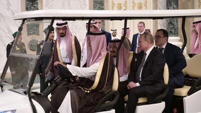 Mr Putin and King Salman meet in Riyadh. EPA
