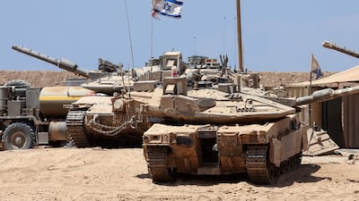 Israeli troops deploy near the border fence with the Gaza strip. AFP