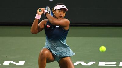 Naomi Osaka hits a backhand. Reuters