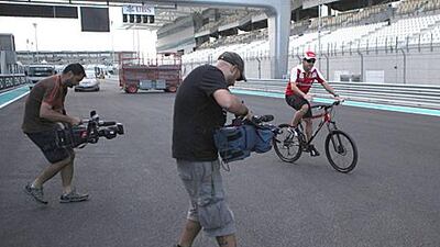 The eyes of the world will be on the championship leader Fernando Alonso, who takes a cycle tour round the Yas Marina Circuit.