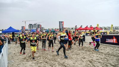 People take part of Tougher Mudder. Courtesy Plus 1 Comms Dubai