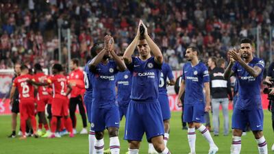Chelsea's players acknowledge their fans. Reuters