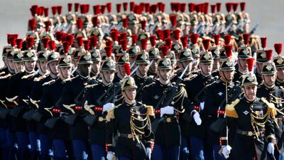 Members of the French Republican Guard march as they arrive for the traditional Bastille day military parade on the Champs-Elysees in Paris, France, July 14, 2017. REUTERS/Yves Herman