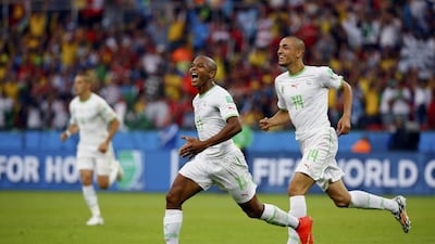 Algeria's Yacine Brahimi, centre, celebrates a goal against South Korea at the 2014 World Cup in Brazil. Damir Sagolj / Reuters / June 22, 2014