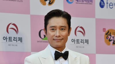 Actor Lee Byung-hun poses for a photo on the red carpet of the 56th annual Daejong Film Awards in Seoul. AFP