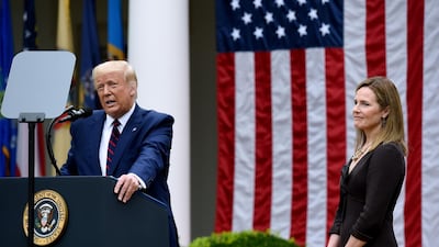 US President Donald Trump speaks next to Judge Amy Coney Barrett at the Rose Garden of the White House in Washington. AFP