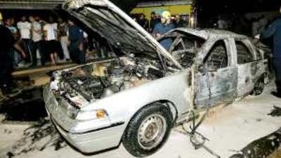 Bahraini firefighters put out the blaze the in the car following the explosion on Thursday night.
