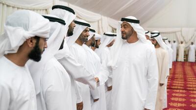 Sheikh Mohamed bin Zayed offers condolences for martyr Warrant Officer Zayed Mosalam Suhail Al Amri. Hamad Al Kaabi / Ministry of Presidential Affairs
