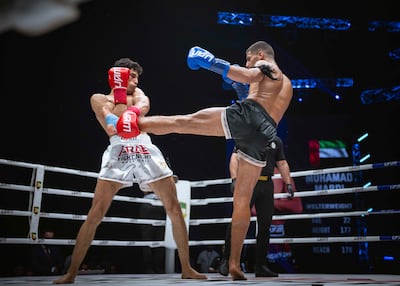 Mohammed Mardi, right, won the title with a unanimous decision victory. Photo: UAEMKFED