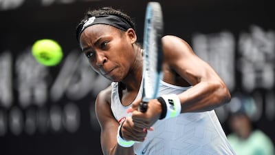 Coco Gauff of the US hits a return against Romania's Sorana Cirstea during their women's singles match on day three of the Australian Open. Gauff, 15, went on to win the match 4-6, 6-3, 7-5. AFP