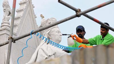Sri Lankan workers spruce up a statue of Queen Victoria – which had previously been dumped in the backyard of Sri Lanka’s national museum for seven years – in Colombo ahead of the November 15 - 17 Commonwealth summit. Ishara S Kodikara / AFP
