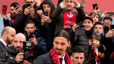 Zlatan Ibrahimovic with AC Milan fans. AFP