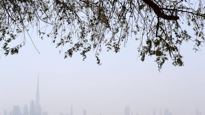 The weather on Monday will be fair to partly cloudy, dusty at times, with a chance of rain. Pawan Singh / The National