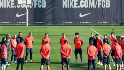 FC Barcelona players and team members observe a minute of silence for the victims of the plane crash near Medellin during their team’s training session at Joan Gamper Sports City in Sant Joan Despi, near Barcelona. Andreu Dalmau / EPA