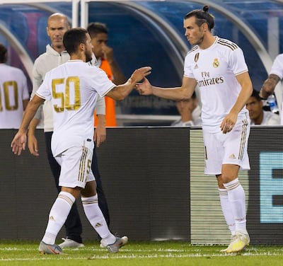Eden Hazard had only just been substituted by Gareth Bale when he watched a battering on the scoreboard turn into on-pitch fighting. Justin Lane / EPA
