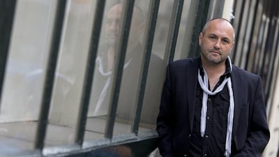 Irish writer Colum McCann has drawn on an assault last year and his exposure to the Middle East in his new collection. Kenzo Tribouillard / AFP