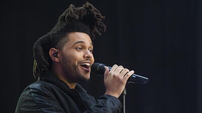 Singer Abel Tesfaye, known by his stage name The Weeknd. Charles Sykes / Invision / AP Photo