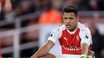 Alexis Sanchez says he is committed to playing for Arsenal. Nigel French / Press Association