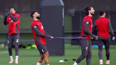 Liverpool's Mohamed Salah with Dominik Szoboszlai during training. Reuters