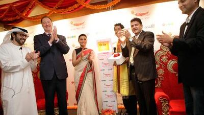 Abdul Rahman Awadh Al Harthi, Director of the Abu Dhabi Radio Network, left, Malcolm Wall CEO of Abu Dhabi Media Bollywood star Rani Mukherjee, host Shardul, Prashant Panday, CEO of Entertainment Network (india) and Sandi Sup Radio Director of Radio Mirchi. Sammy Dallal / The National