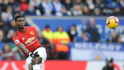 Manchester United's Paul Pogba plays a ball forward. AP Photo