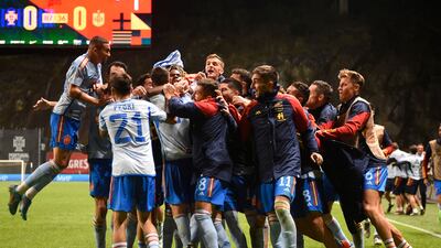 Spain players celebrate after beating Portugal to advance to the Nations League semi-finals. AFP
