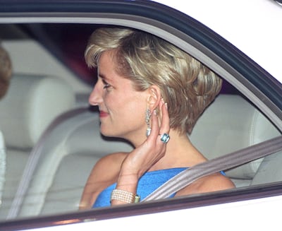 Diana, Princess of Wales, wears the aquamarine ring in October 1996 to attend the Victor Chang Research Institute Dinner Dance in Sydney. Getty Images