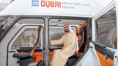 Sheikh Mohammed reviews a Sky Pod model being tested by Dubai's Roads and Transport Authority, in February 2019.