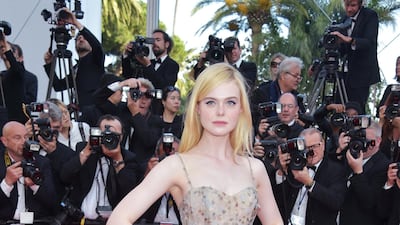 Elle Fanning wears Dior to Cannes Film Festival in 2017. Getty Images