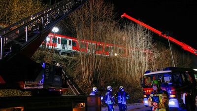 Emergency services workers at the scene of the S-bahn commuter trains collision in Munich, southern Germany, on February 14. AFP