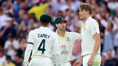 Australia's Cameron Green, right, is congratulated by Steve Smith after dismissing Ben Stokes. AP