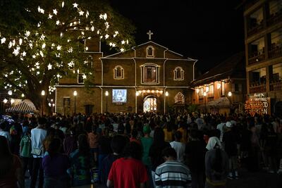 Many Filipino migrant workers use their annual leave over Christmas to reunite with their families. AFP