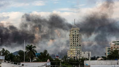 Smoke from burning cars hangs over the Mexican city of Culiacan on October 17, 2019 after gang members faced off with security forces. AP Photo