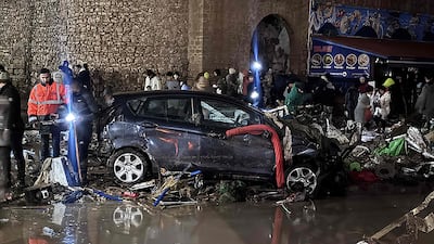 Debris left by the flood, which damaged cars and cut off roads