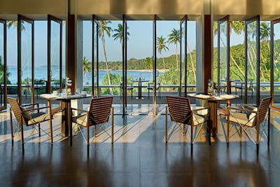 The restaurant overlooks the pool and beach. Photo: Amanwella