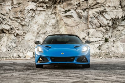 With its low proportions, sculpted bodywork and dramatic air intakes, the Emira borrows visual cues from the Lotus Evija hypercar. Photo: Lotus