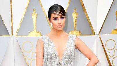 Olivia Culpo opted for antique layered lace gown from Marchesa. Courtesy Harvey Nichols