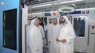 Mattar Al Tayer, director general and chairman of Dubai’s Roads and Transport Authority, shows Sheikh Mohammed bin Rashid, Vice President and Ruler of Dubai, Sheikh Hamdan bin Mohammed, Crown Prince of Dubai, Sheikh Maktoum bin Mohammed, Deputy Ruler of Dubai, and Sheikh Mansoor bin Mohammed the new interior design of the Dubai Metro carriages, which are being manufactured in France under a contract for the supply of 50 trains. Wam