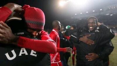 UAE players and staff celebrate after beating host Uzbekistan 3-2 to qualify for the London 2012 Olympic.