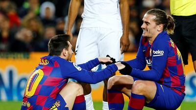 Barcelona's Lionel Messi and teammate Antoine Griezmann. EPA